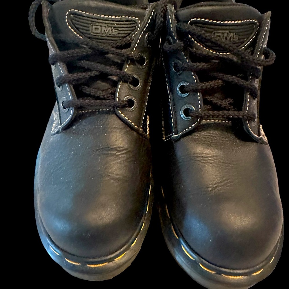Doc Marten leather shoe with rugged heel Made with Polished Smooth leather.